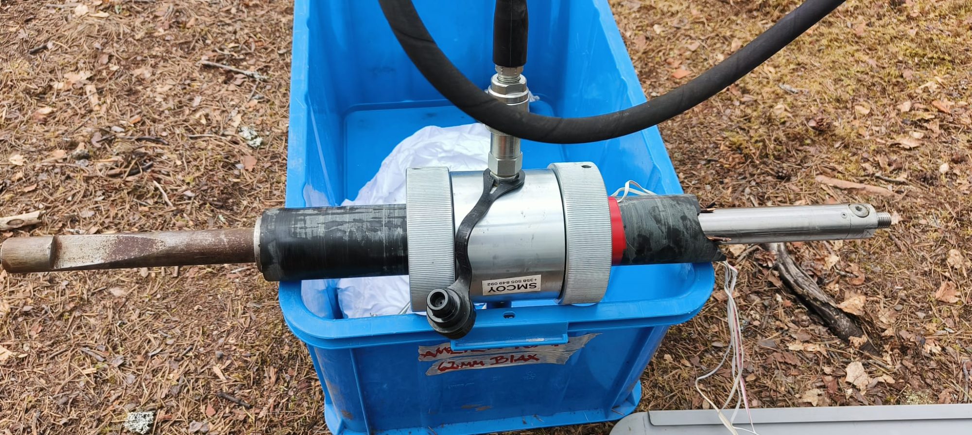 measurement process, blue plastic box on a ground