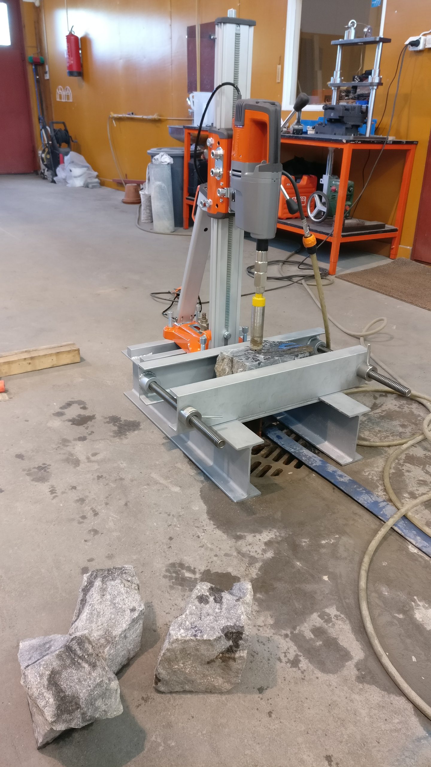 Rock samples on the floor, core drilling at the laboratory